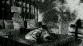 a woman laying on a couch in a living room