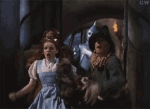 a scene from the movie the wizard of oz with gw on the bottom right