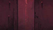 a close up of a person 's face in a dark room