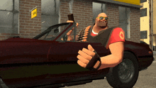 a man in a red shirt is giving a thumbs up while sitting in a car