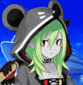 a girl with green hair is wearing a mouse hat with the letter c on it