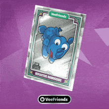 a veefriends card with a blue rhinoceros on a purple background