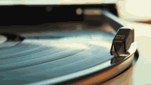 a record player with a mmc 20 e needle on it