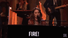 Fire Singing GIF - Fire Singing Singer GIFs