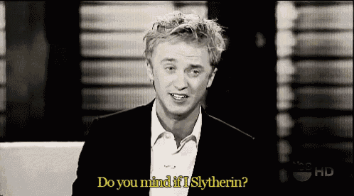 a black and white photo of a man with the words do you mind if i slytherin