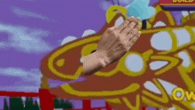 a person 's hands are folded in front of a cartoon drawing of a ferris wheel .