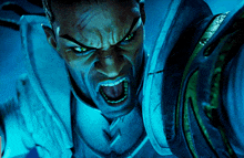 a close up of a man 's face with his mouth wide open