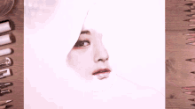 a drawing of a woman 's face with a pencil