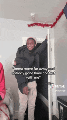 a man is standing in a doorway with a caption that says imma move far away