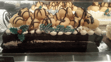 a cake with a merry christmas sign on top of it
