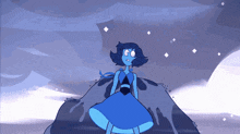 a blue cartoon character is standing on a rock