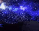 a person looking up at a starry night sky with the word galaxy visible