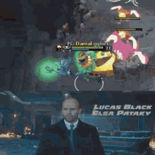 a man in a suit and tie is standing in front of a poster that says lucas black elsa pataky