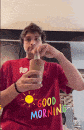 a man in a red shirt that says good morning
