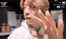 a recording of a man 's face is being taken from tokyo
