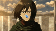 a close up of a girl with a blue bird on her nose