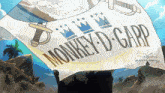 a monkey d. garp flag is flying in the air