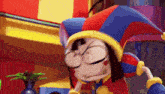 a cartoon character wearing a jester 's hat is making a funny face .