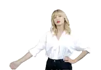 a woman in a white shirt flexes her muscles