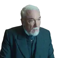 a man with gray hair and a beard is wearing a suit