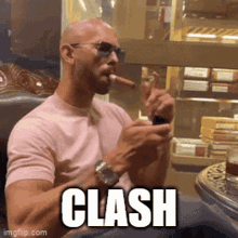 a man is smoking a cigar and the word clash is on the bottom