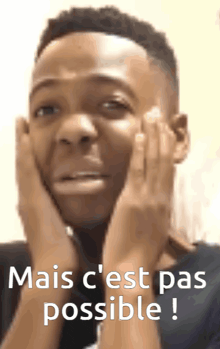 a man with his hands on his face and the words mais c'est pas possible on the bottom