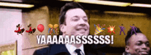 a man in a suit and tie is laughing with the words yaaaaasssss