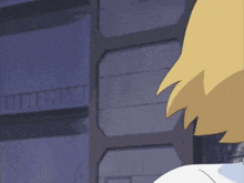 a close up of a cartoon character 's face with a building in the background