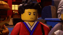 a lego character with a serious look on his face is standing in a room