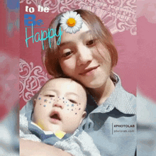 a woman holding a baby with a flower on her head and the words to be happy on the bottom