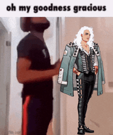 a man in a black shirt is standing in a hallway next to a picture of a man with white hair