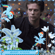 a picture of a man surrounded by flowers and ponies with abolish prisons written at the bottom