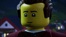a close up of a lego man 's face with a slight smile