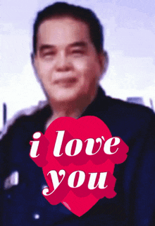 a man 's face is behind a heart that says i love you