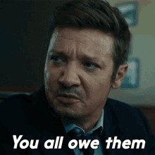 You All Owe Them Mike Mclusky GIF - You All Owe Them Mike Mclusky Jeremy Renner GIFs