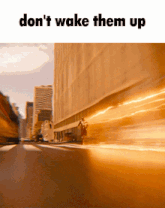 a picture of a man running down a street with the words " don 't wake them up "