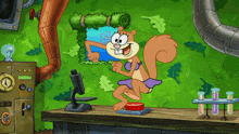 sandy cheeks from spongebob squarepants is standing on a table