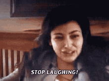 Stop Laughing GIF - Stop Laughing Kim Kardashian GIFs