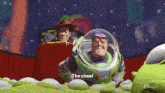 woody and buzz lightyear from the movie toy story are standing next to each other