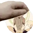 a hand is holding a picture of a man sitting in a circle .