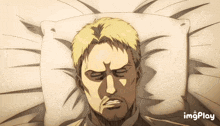 a man is laying in a bed with his eyes closed and a pillow .