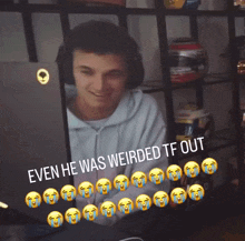 a man sitting in front of a laptop with the words even he was weirded tf out above him