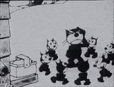 a black and white cartoon of felix the cat and his cats