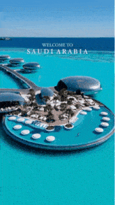 a welcome to saudi arabia poster with a swimming pool in the middle of the ocean
