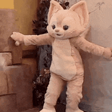 a person is holding a stuffed animal in a costume .