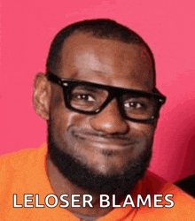 a man wearing glasses and an orange shirt with the words leloser blames