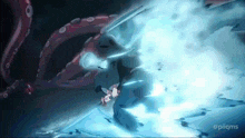 a cartoon character is being attacked by a giant octopus with a blue light coming out of it 's mouth .