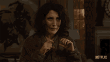 a woman making a funny face with a netflix logo in the corner