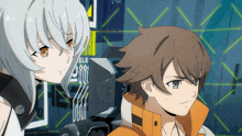 a boy and a girl are standing next to each other in front of a machine that says ele