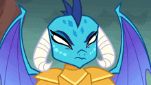 a cartoon dragon with horns and a blue head